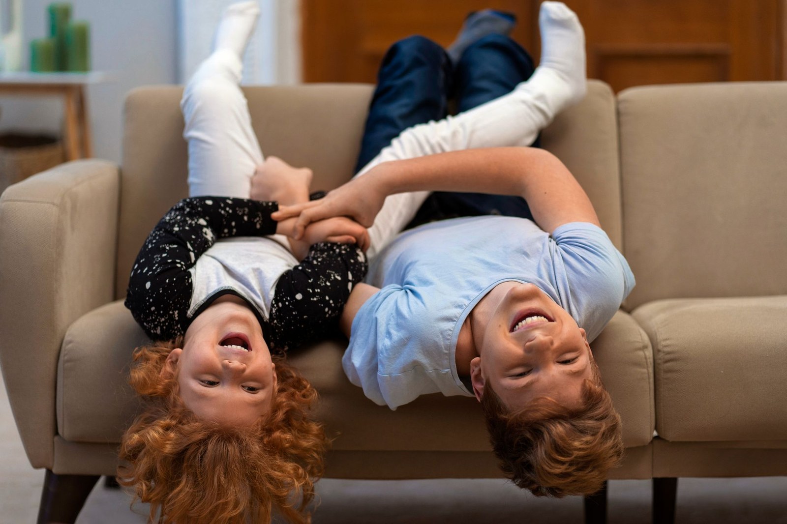 Family relaxing on a couch at home