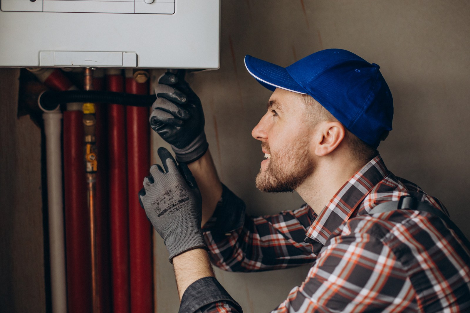 Technician working on a heating system